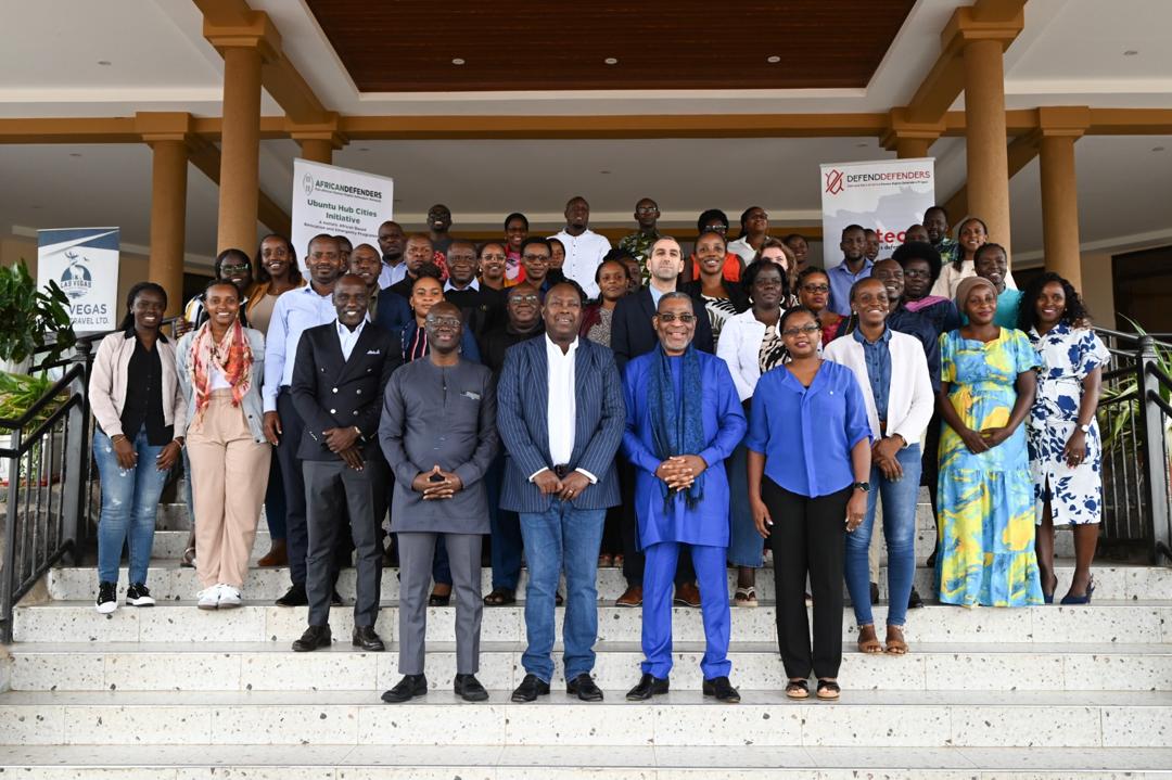 Group photo of approximately 200 human rights defenders at the DefendDefenders 20th Anniversary in Kampala